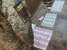 СБУ викрила керівництво Центральної військово-лікарської комісії ЗСУ на одержанні хабарів (фото)