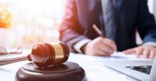 Юрисдикція спору щодо розпорядженням часткою у ТОВ одним із подружжя