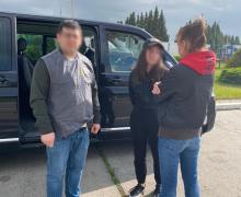 З Німеччини екстрадовано підозрювану у справі щодо заволодіння державними землями під Києвом
