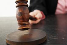 Юрисдикція спору про визнання недійсним договору продажу акцій в юрособі без згоди другого з подружжя