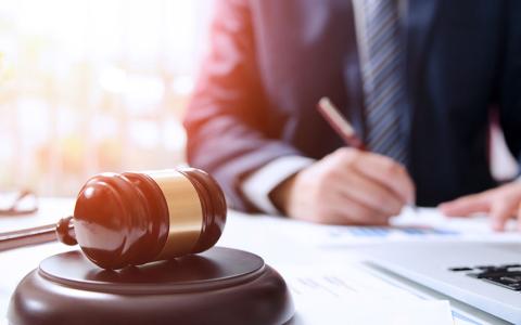 Юрисдикція спору щодо розпорядженням часткою у ТОВ одним із подружжя